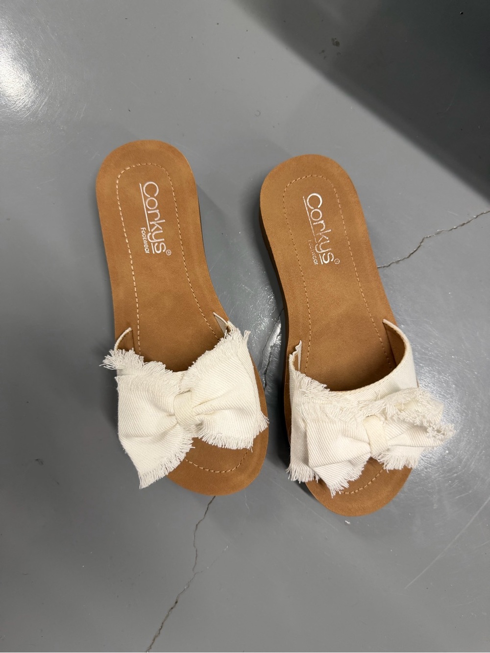 Corkys Cream spray bow sandals
